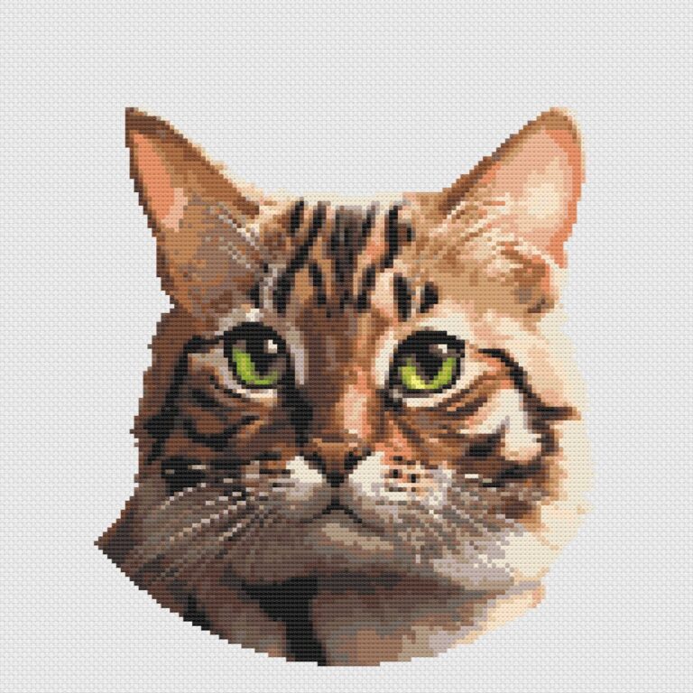 Bengal cat cross stitch on white Aida cloth