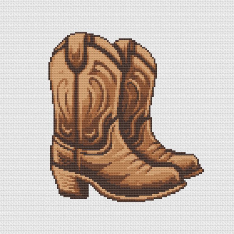 Cowboy boots cross stitch on white Aida cloth