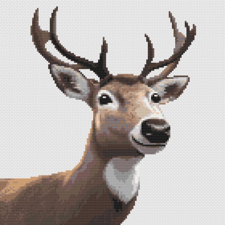 Realistic reindeer cross stitch on white Aida cloth